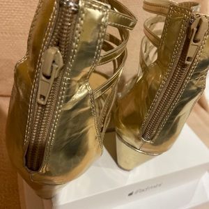 Gold gladiator sandals